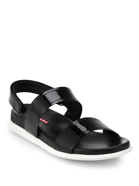 prada black flat sandals.